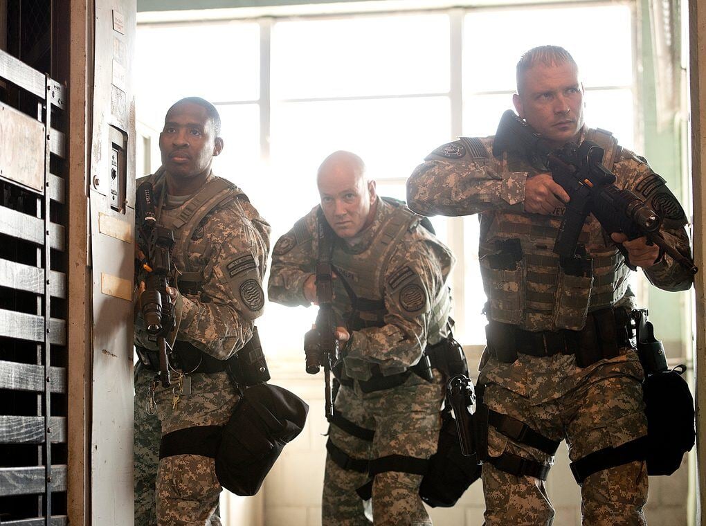 soldiers breaching door