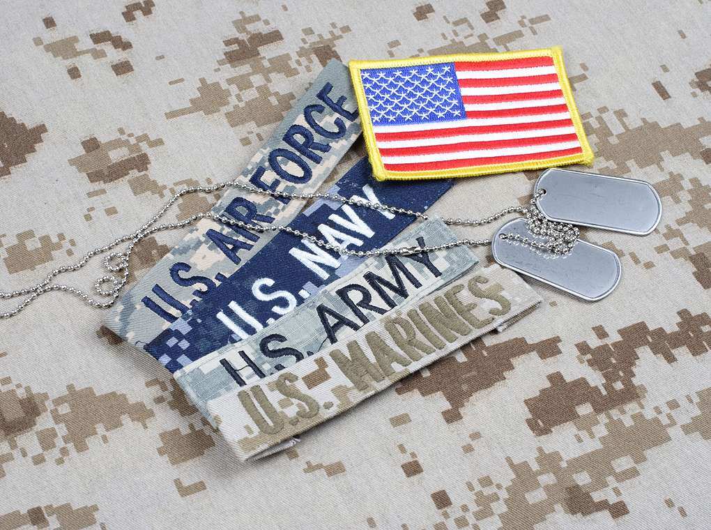 U.S. air force, navy, army, and flag patches with dog tags