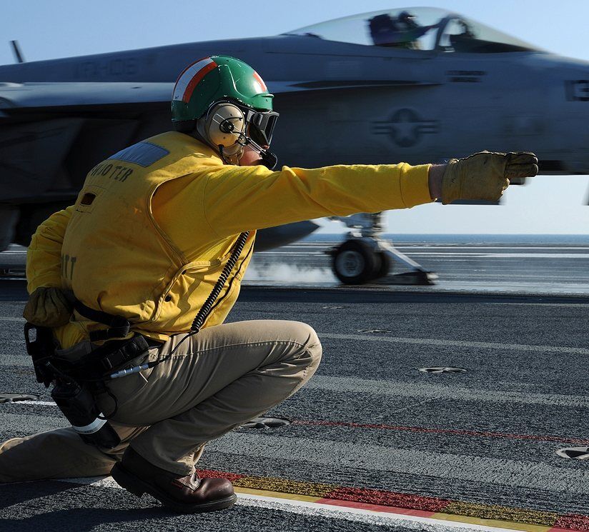 shooter signals F-18 super hornet take off