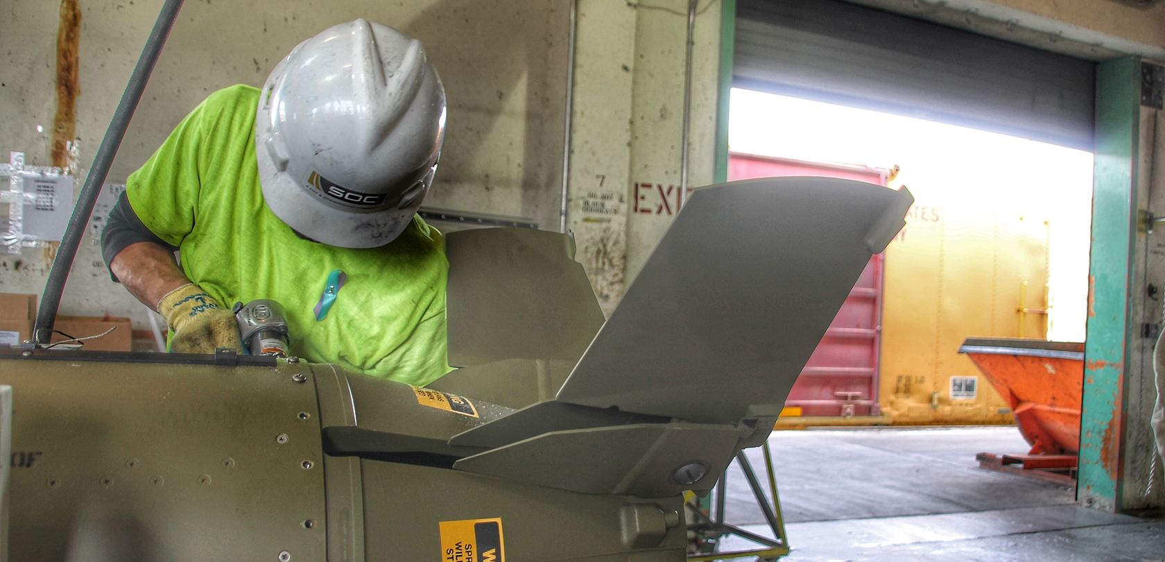 factory worker defusing munitions